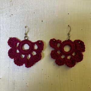 Aros tejidos a Crochet con forma de mariposa.